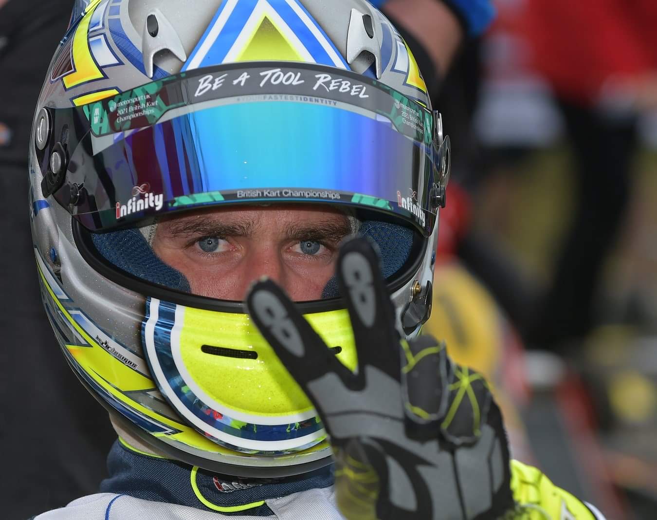 Karting helmet close-up showing driver focus